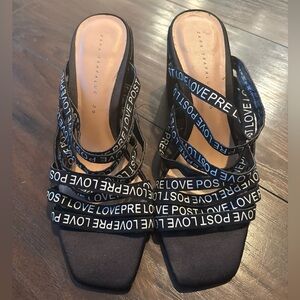 Zara Trafaluc size 36 (5.5/6) black strappy heels with "LOVE" and "POST" text